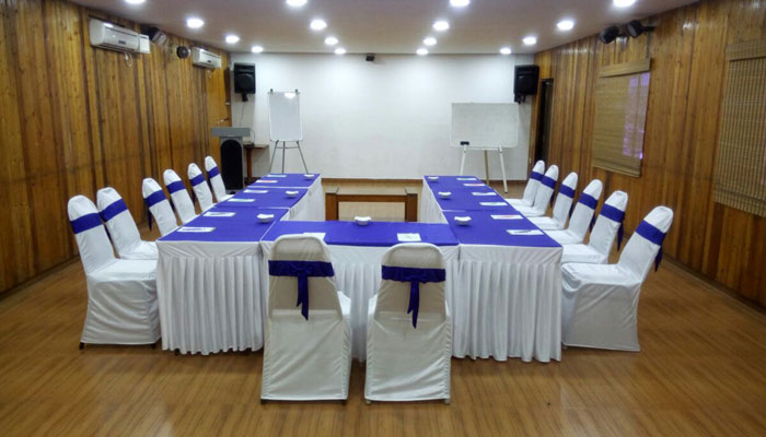Conference hall with U shaped seating with board, mic, speakers and airconditioners in Bluebay beach resort, ECR, Chennai