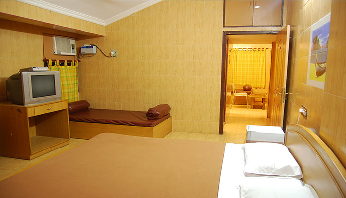 Interconnected room with bedrooms, beds, sofa-cum-bed, teleision, Airconditioner in Bluebay beach resort