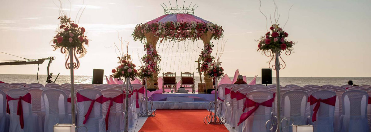 Beach wedding stage decoration and seating arrangement in Bluebay Beach Resort, East Coast Road, Chennai